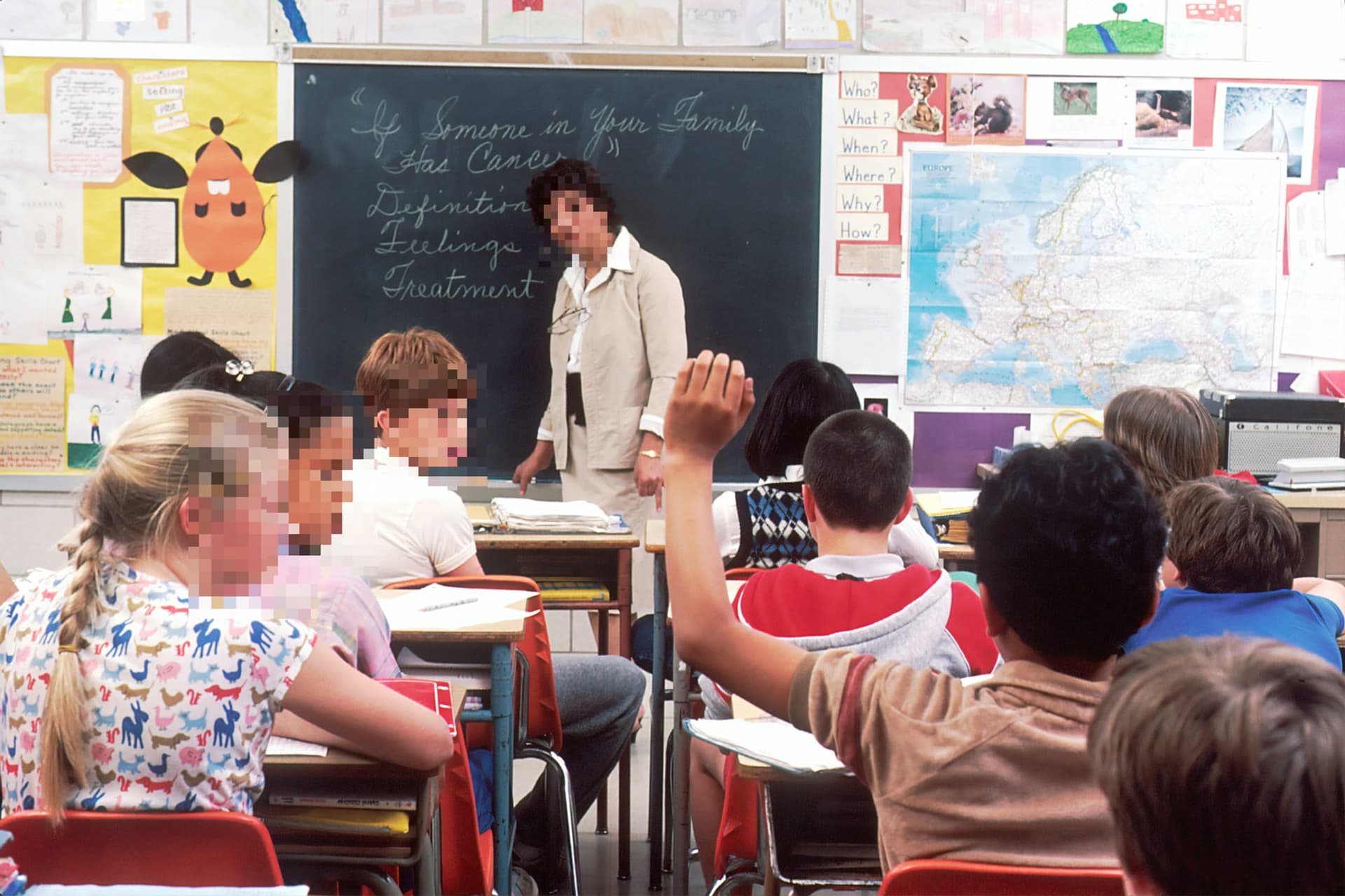 Children in classroom with their faces pixelated for privacy using BlurMe