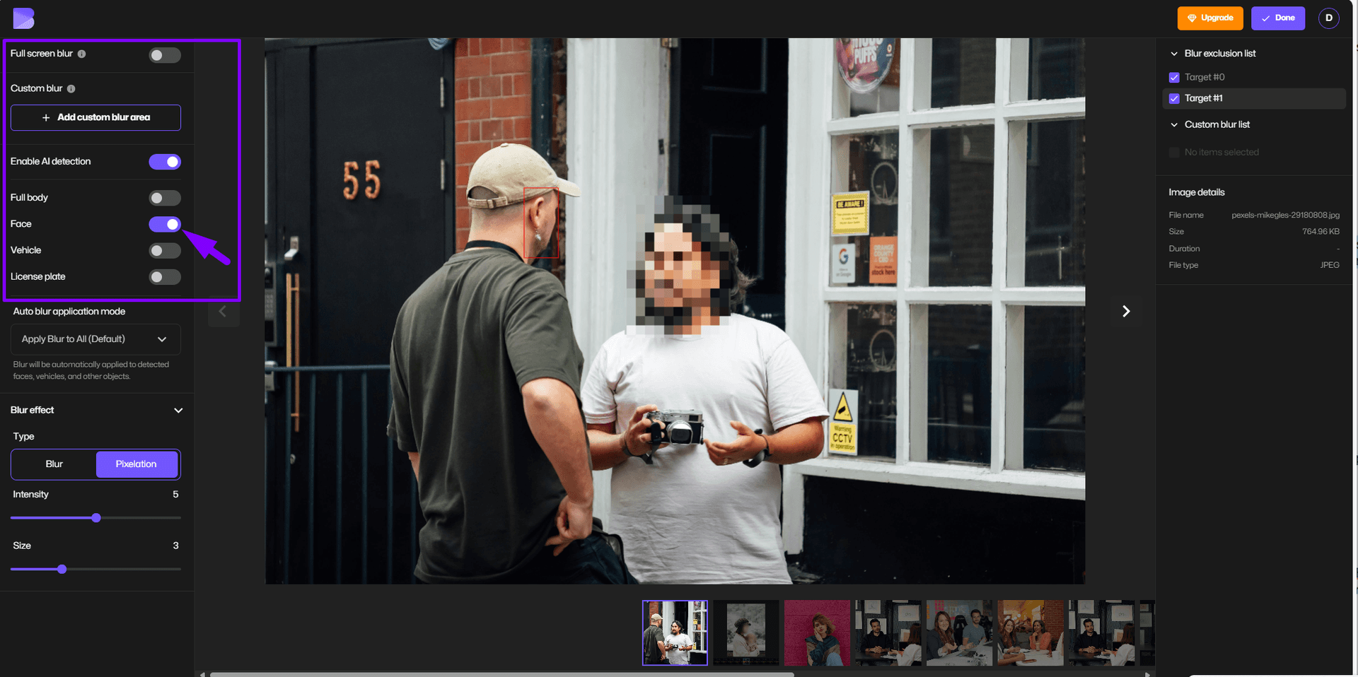 Pixelated face in image.