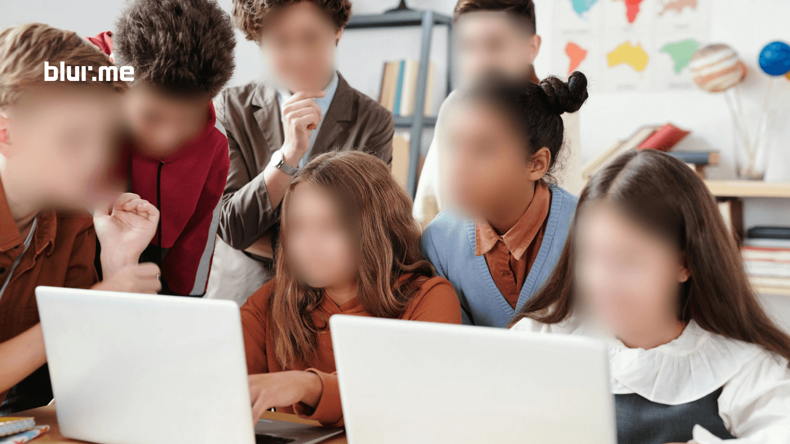 Students at school event with faces anonymized using BlurMe AI.